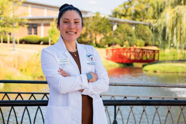 PA student Kimberly Siguenza Depaz '21, '25, in Sarah's Glen on Shenandoah University's main campus.